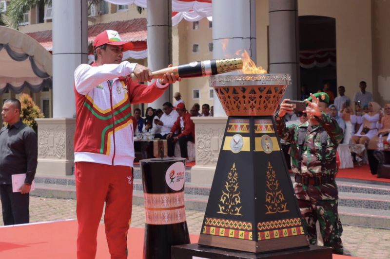 pemkab-nagan-raya:-kirab-obor-pon-simbol-persatuan-kesatuan-bangsa