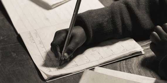 What happened when a South African school switched from English to bilingual science tests