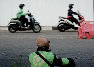 bekerja-tanpa-jaring-pengaman:-pengemudi-ojol-diinjak-perusahaan-platform-dan-dighosting-negara