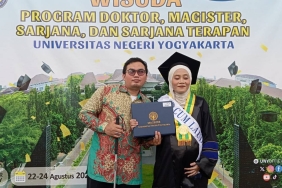 hamil-di-tengah-perjuangan-tesis,-toviyani-tak-memilih-menyerah-dan-malah-lulus-cumlaude